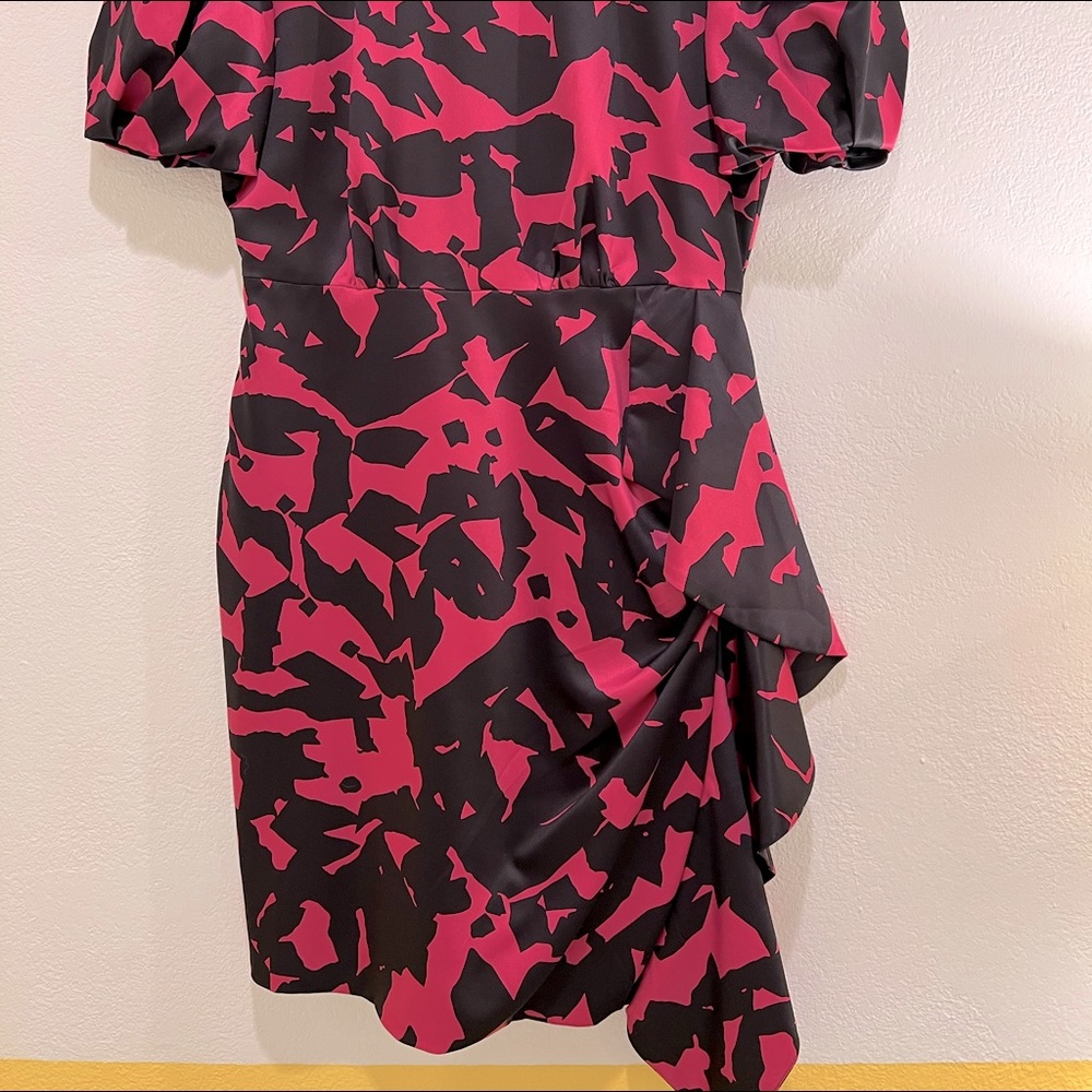 Beautiful satin Milly dress, with flowing ribbon on one side